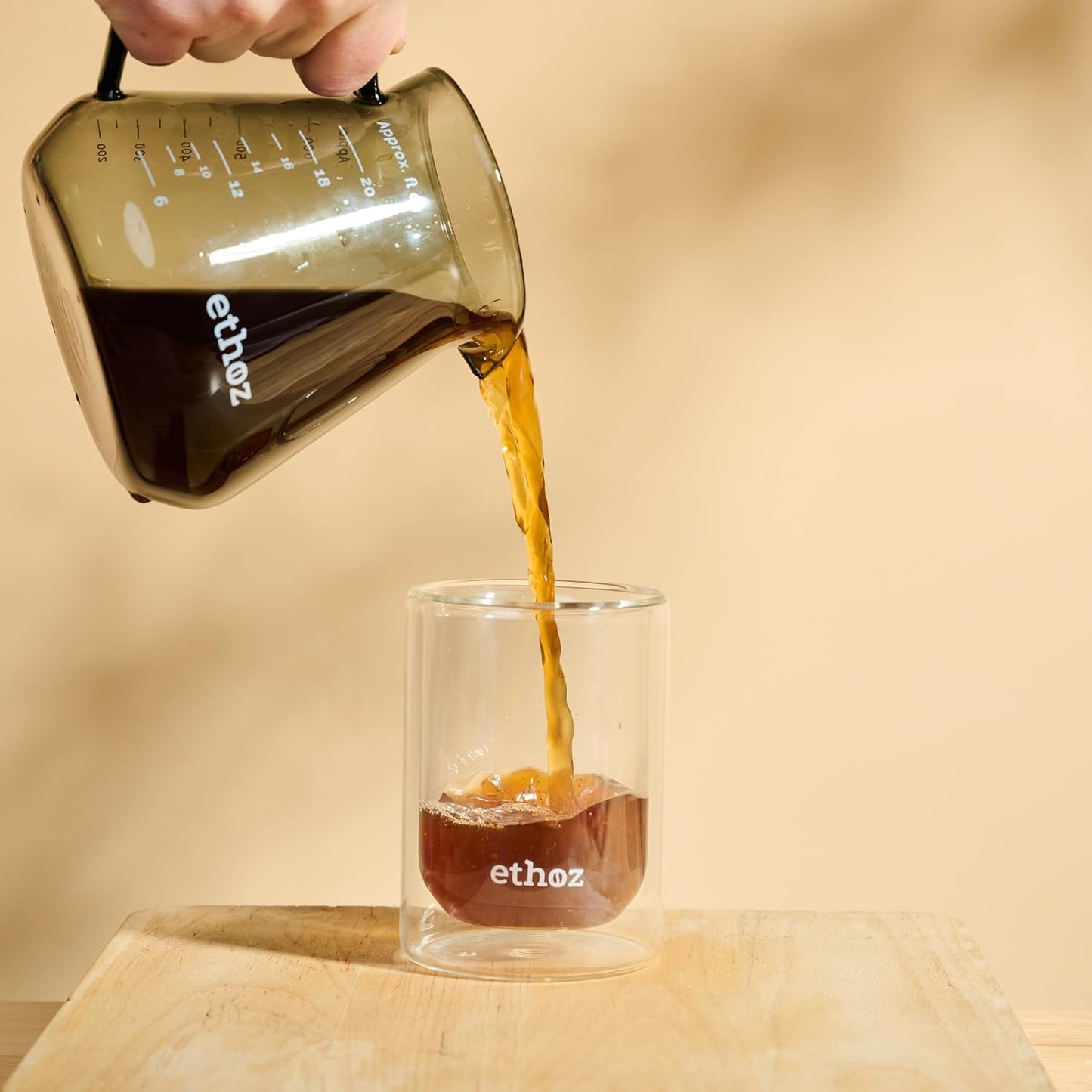 Ethoz® Glass Carafe – Sleek, Borosilicate Glass Pitcher for Brewing & Serving. Ergonomic Design, Calibrated Measurements, and Temperature-Resistant Durability. Perfect for Coffee, Cocktails, and More.